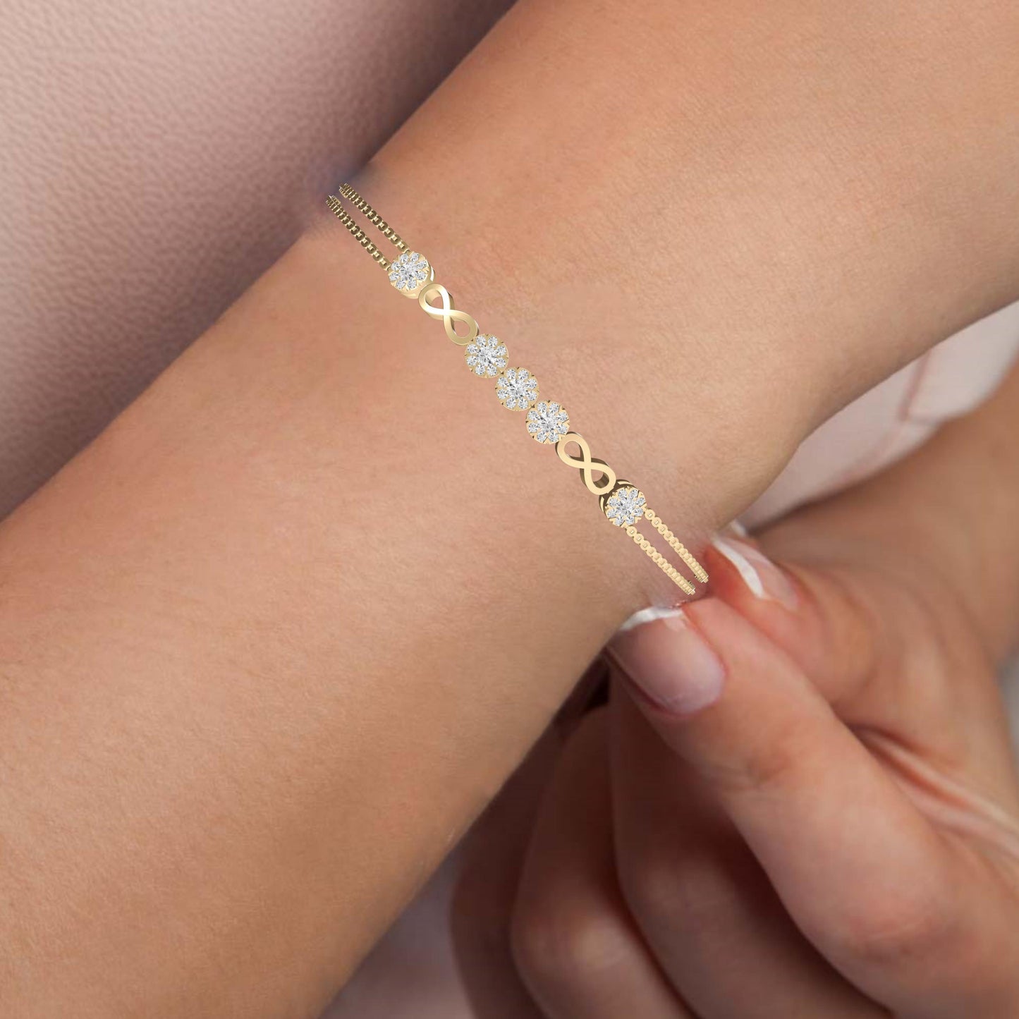 Sparkling Infinity Charm Bracelet in 14k Yellow Gold